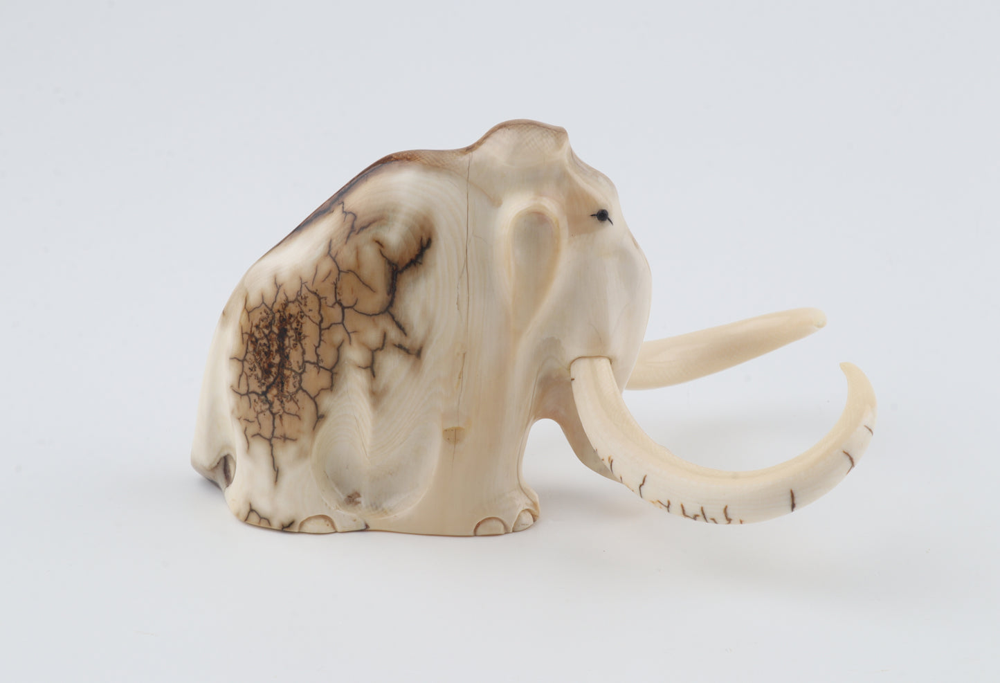 Carved mammoth figurine