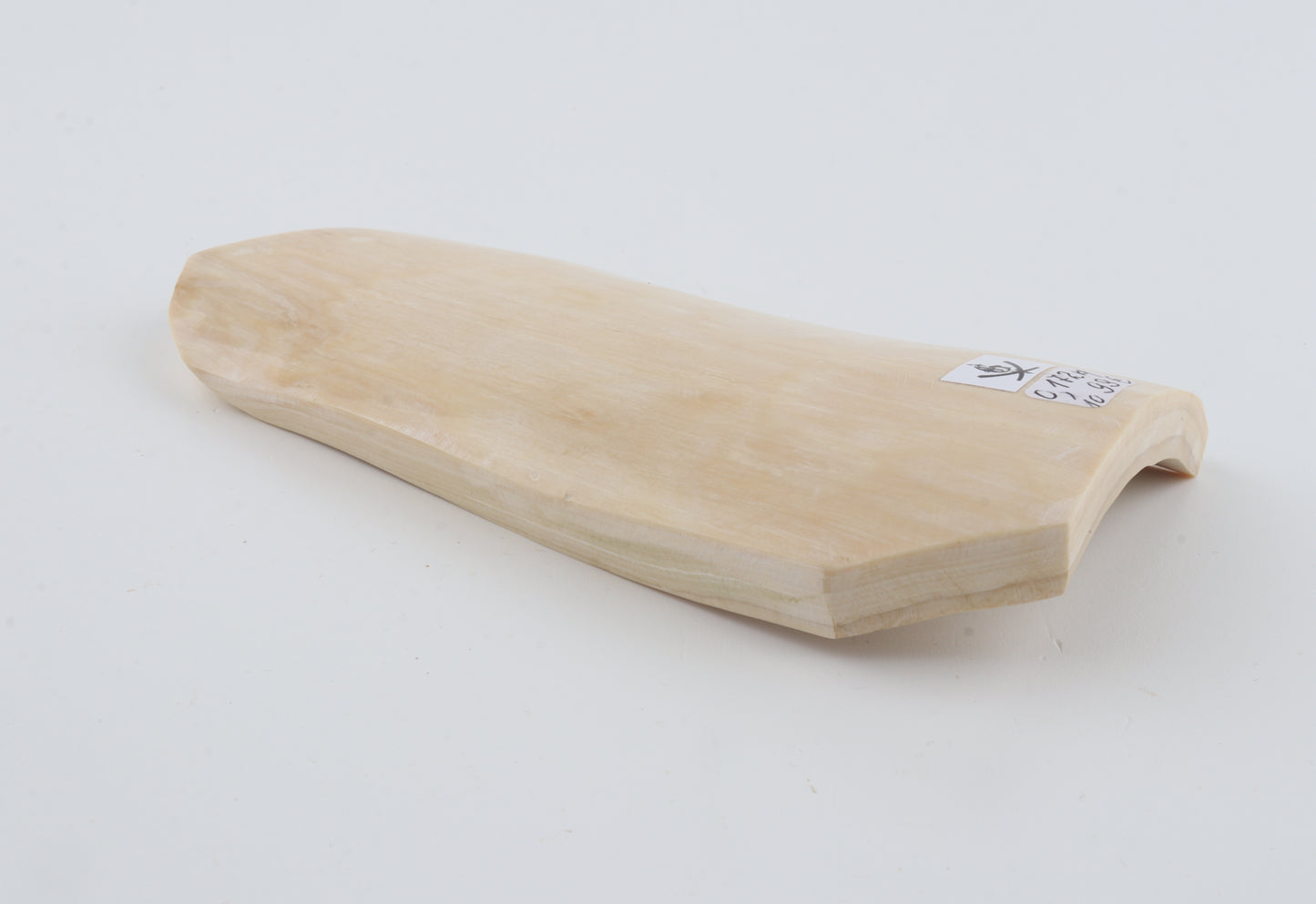 White mammoth ivory piece