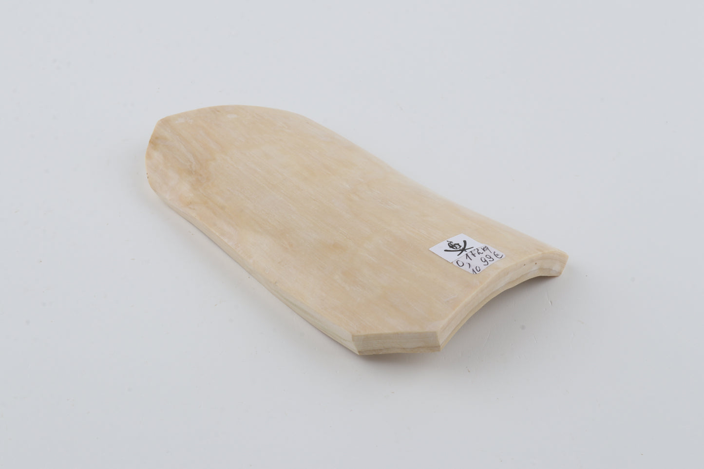 White mammoth ivory piece