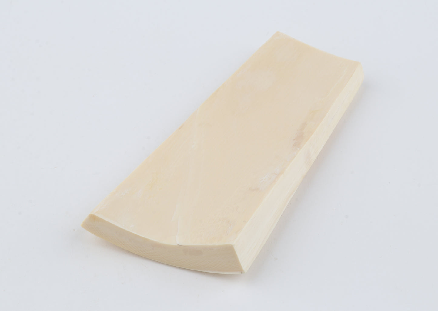 White mammoth ivory piece