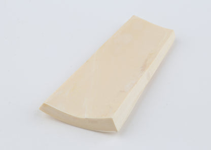 White mammoth ivory piece