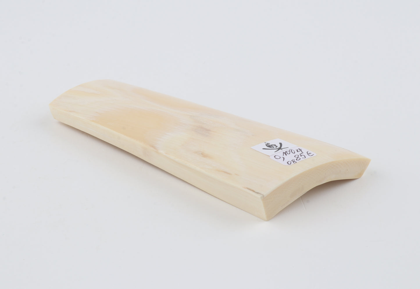 White mammoth ivory piece
