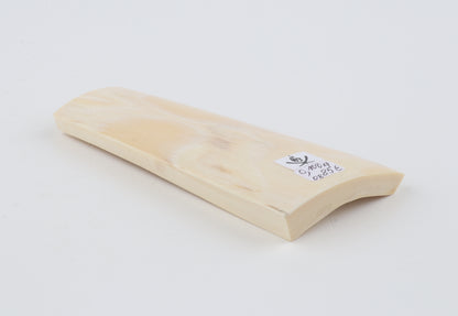 White mammoth ivory piece