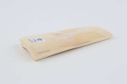 White mammoth ivory piece