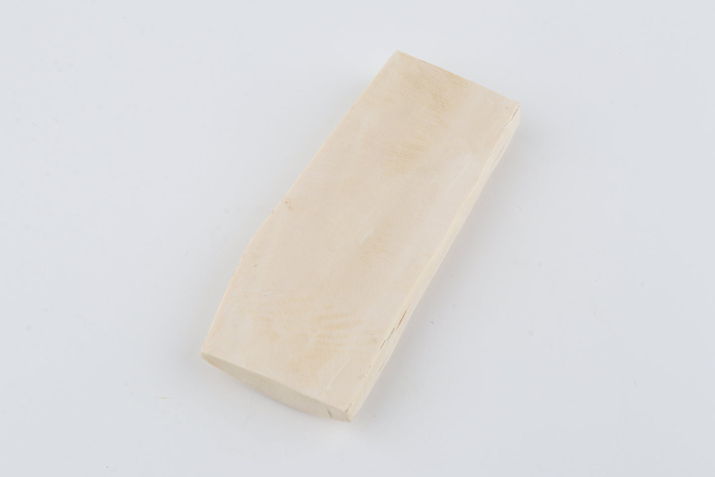 White mammoth ivory piece