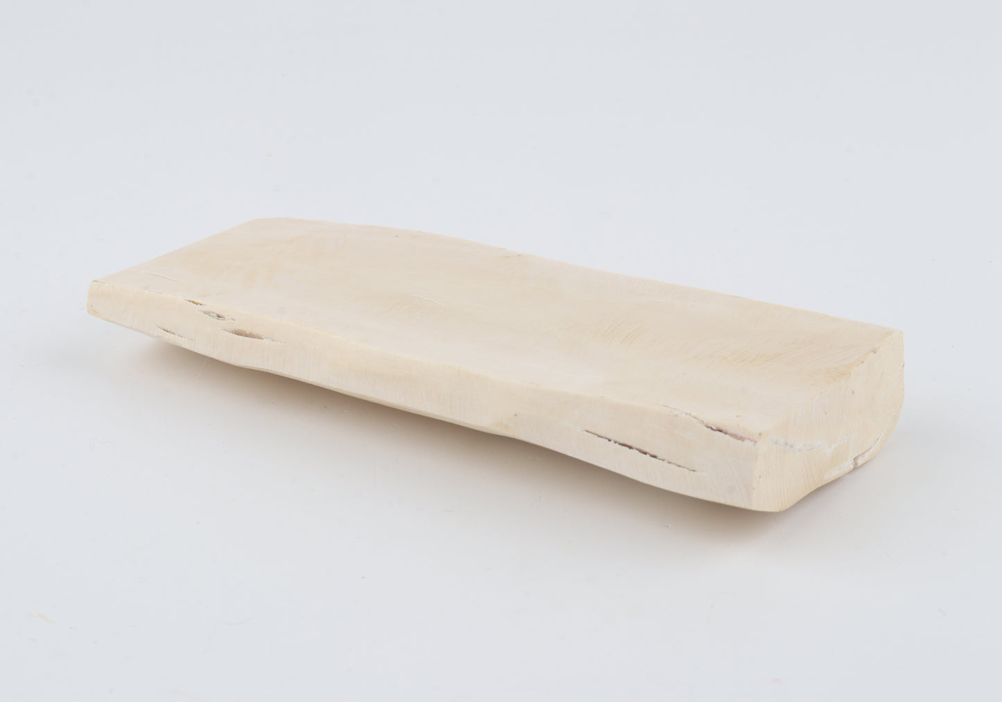 White mammoth ivory piece