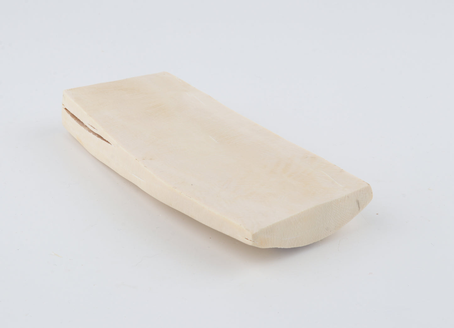 White mammoth ivory piece