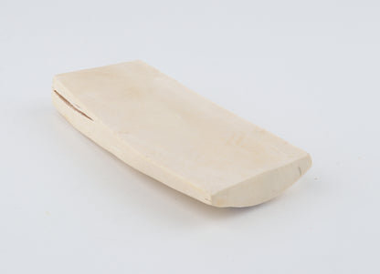 White mammoth ivory piece
