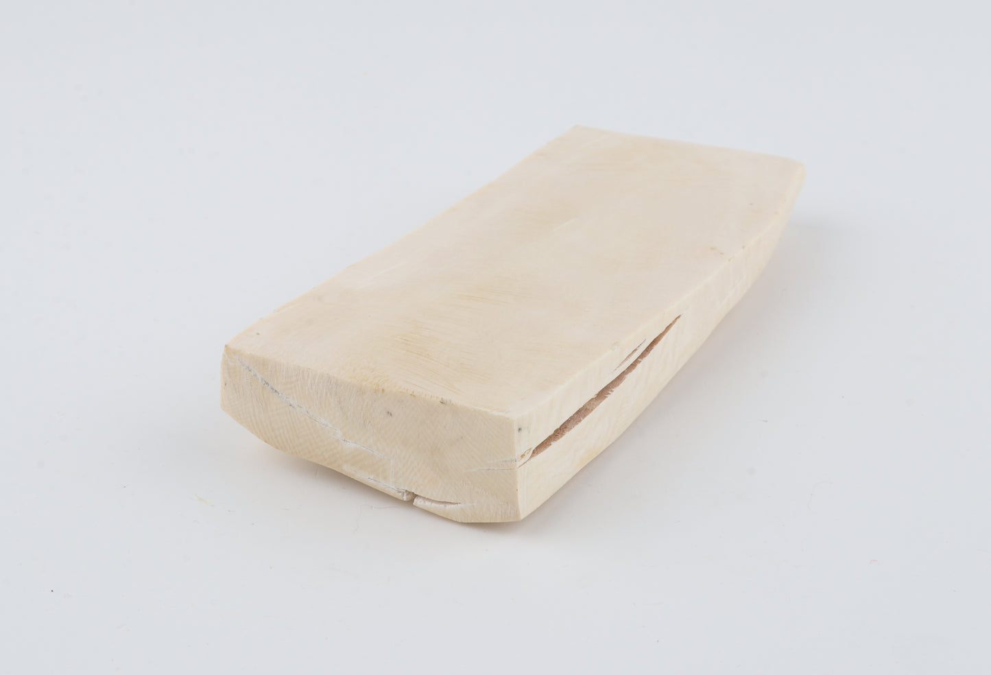 White mammoth ivory piece