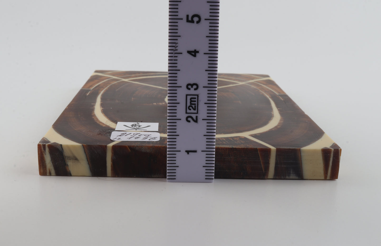 Stabilized mammoth ivory scales