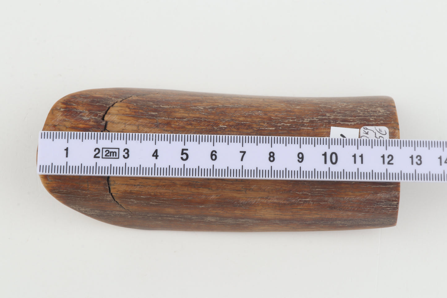 Brown mammoth ivory piece