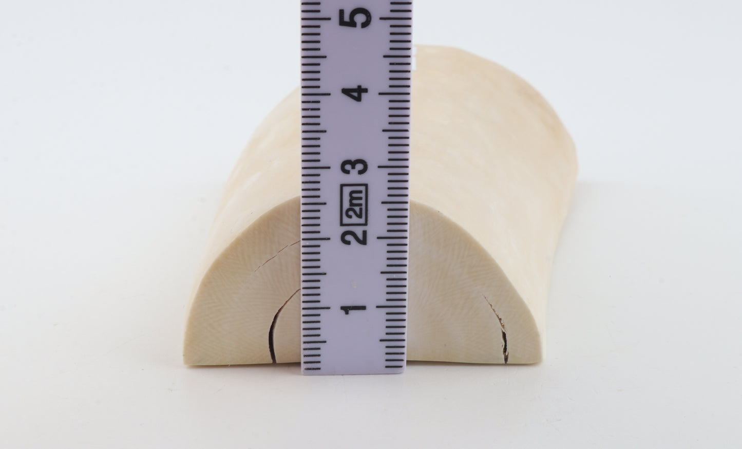 White mammoth ivory piece