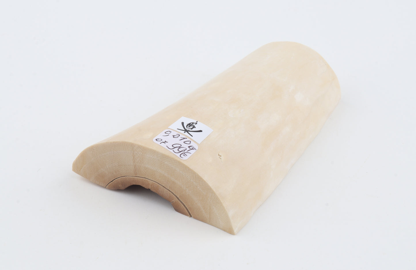 White mammoth ivory piece