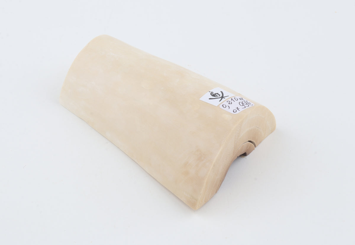 White mammoth ivory piece