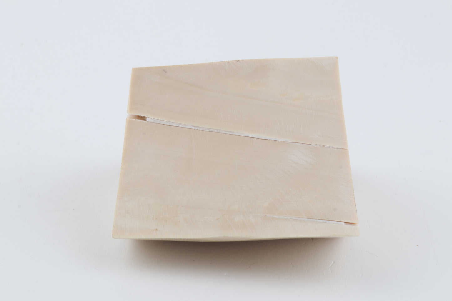 White mammoth ivory piece