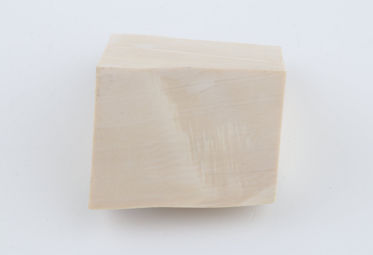 White mammoth ivory piece