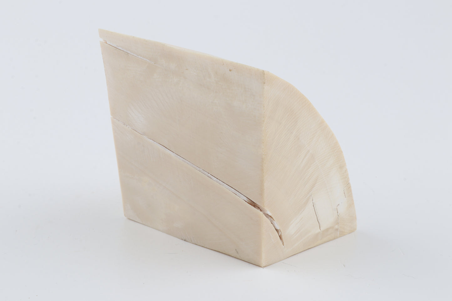 White mammoth ivory piece