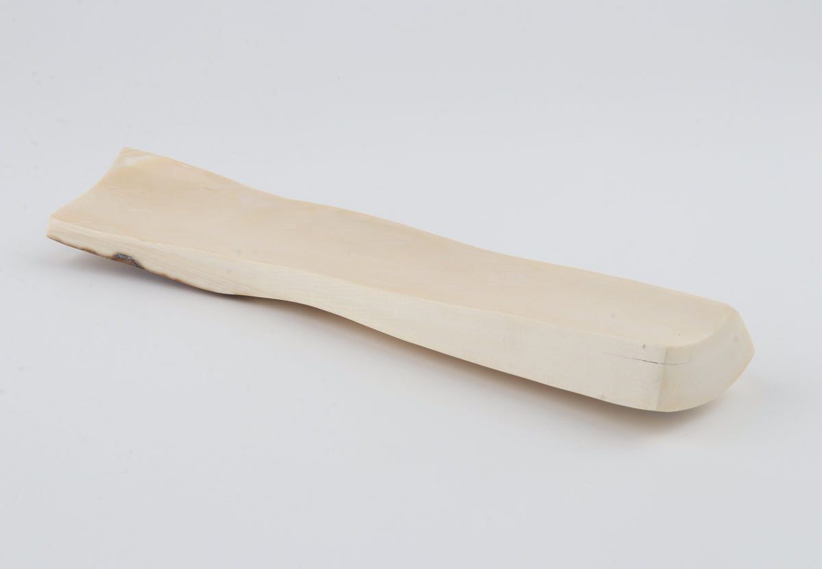 White-brown mammoth ivory piece