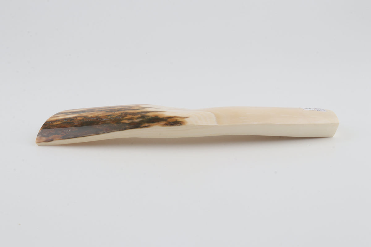 White-brown mammoth ivory piece