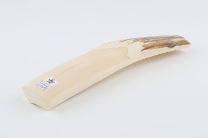White-brown mammoth ivory piece
