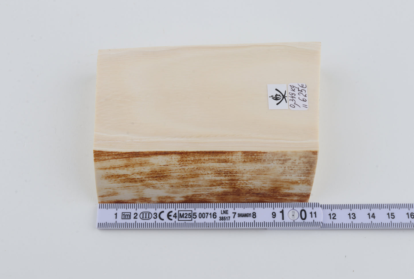 White mammoth ivory piece
