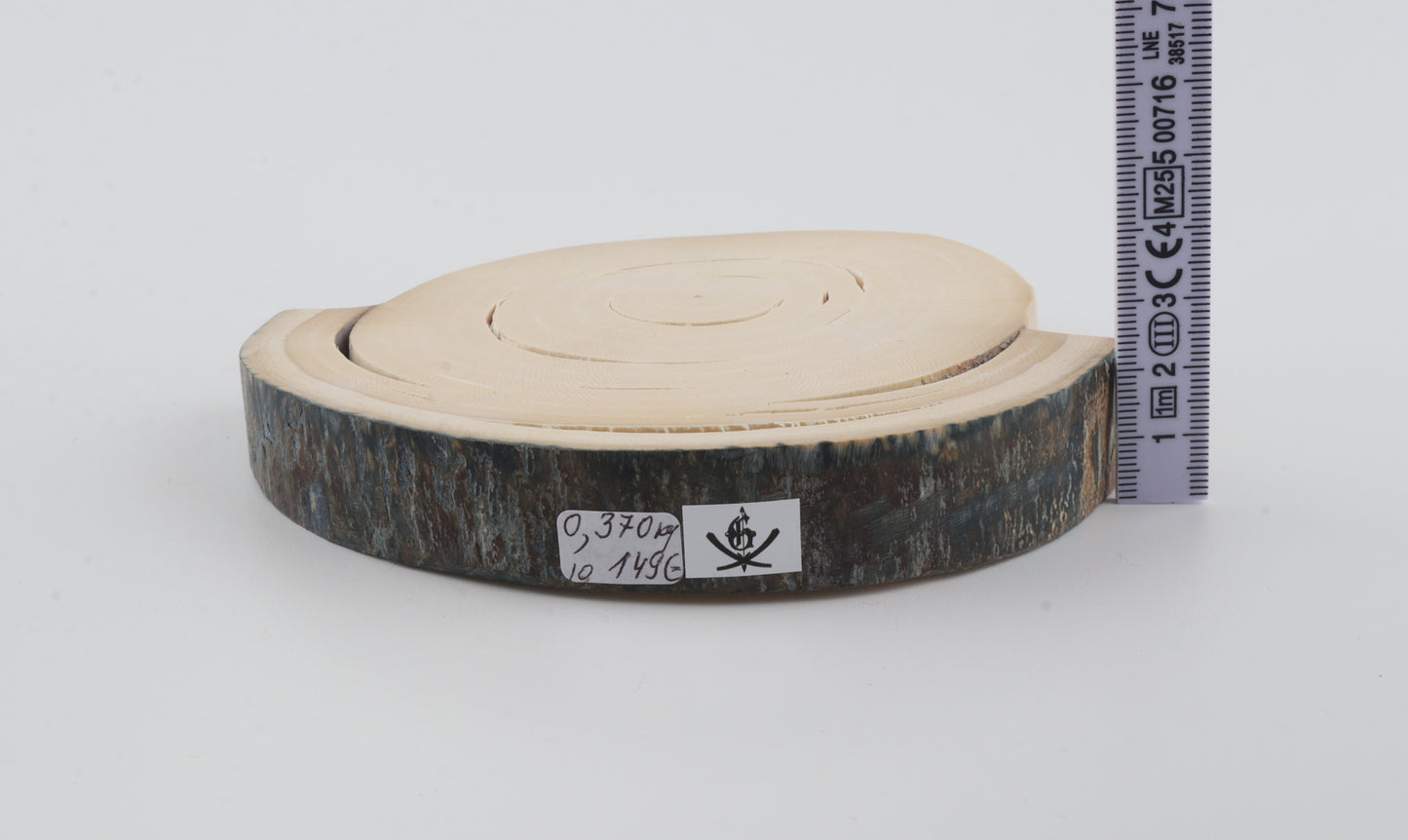 Round mammoth tusk piece