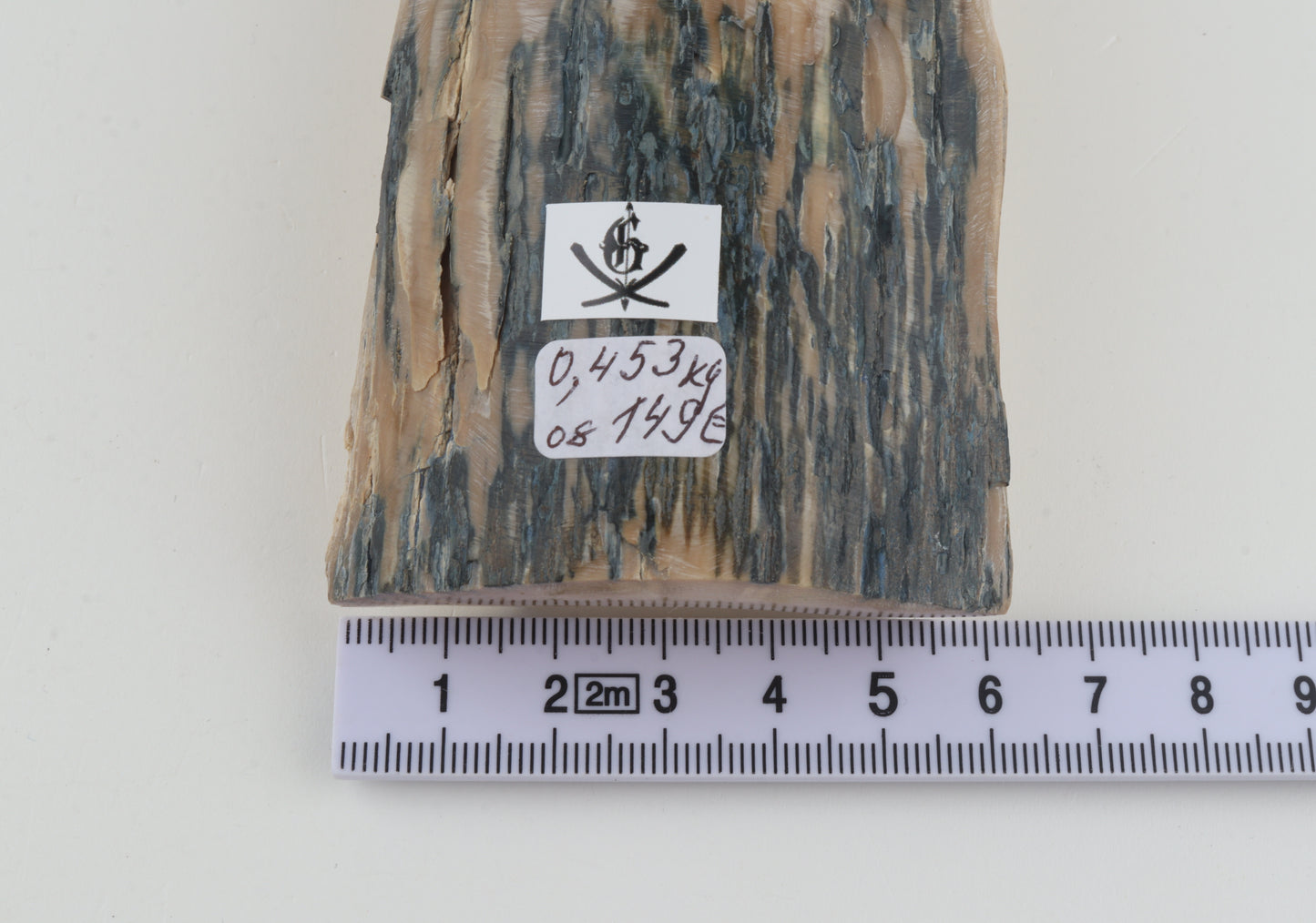 Creme-blue mammoth ivory piece