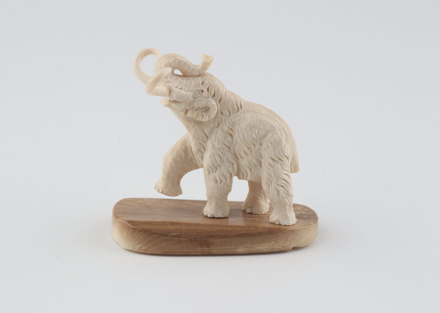 Carved woollly mammoth figurine