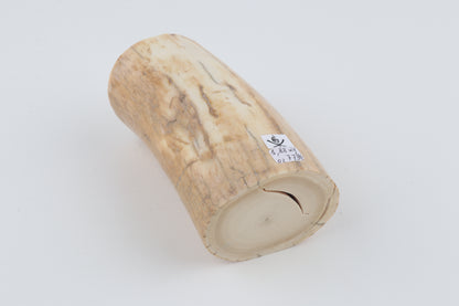 Round woolly mammoth ivory piece