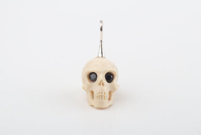 Festive Mammoth Ivory Skull Pendant 
