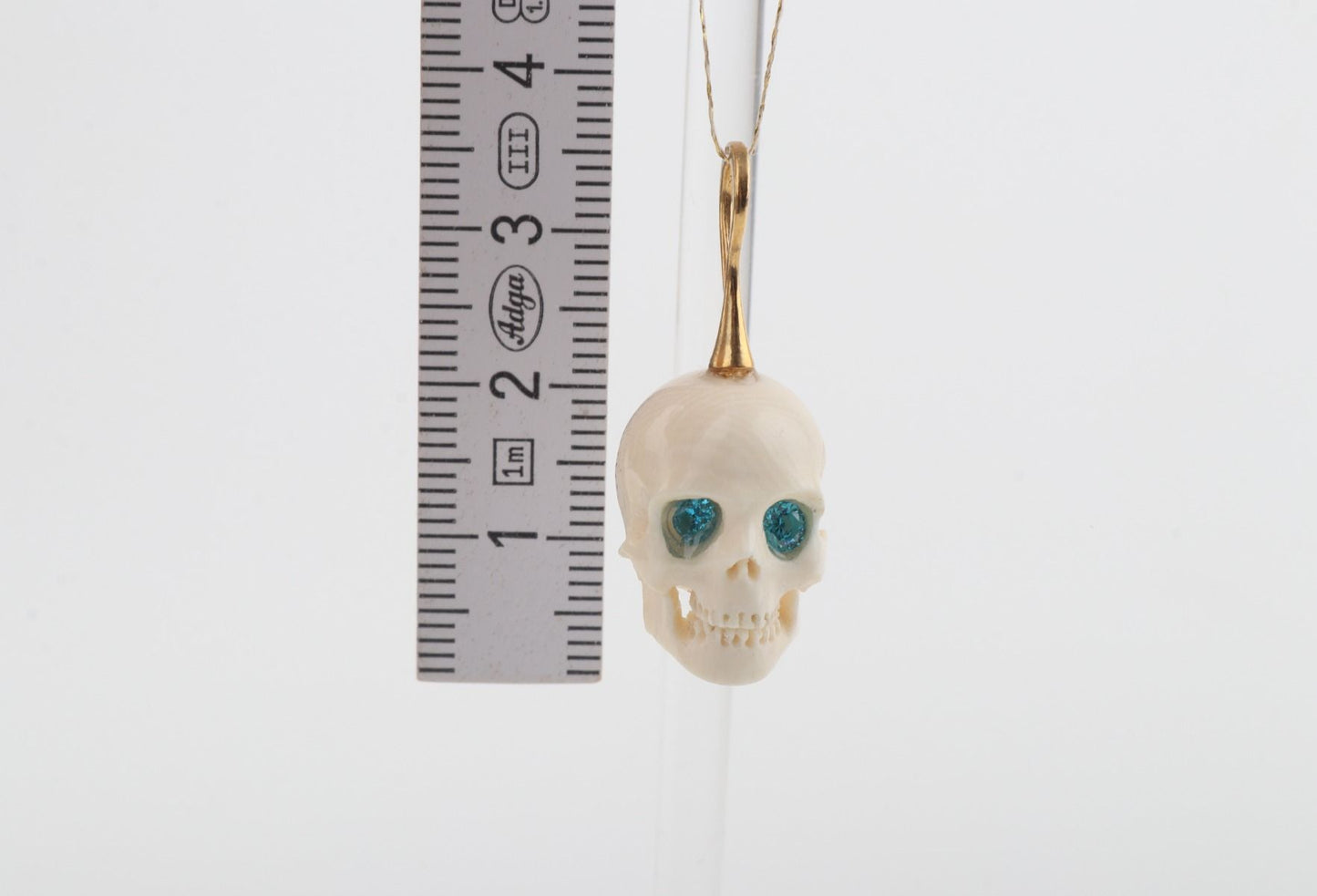 Festive Mammoth Ivory Skull Pendant 
