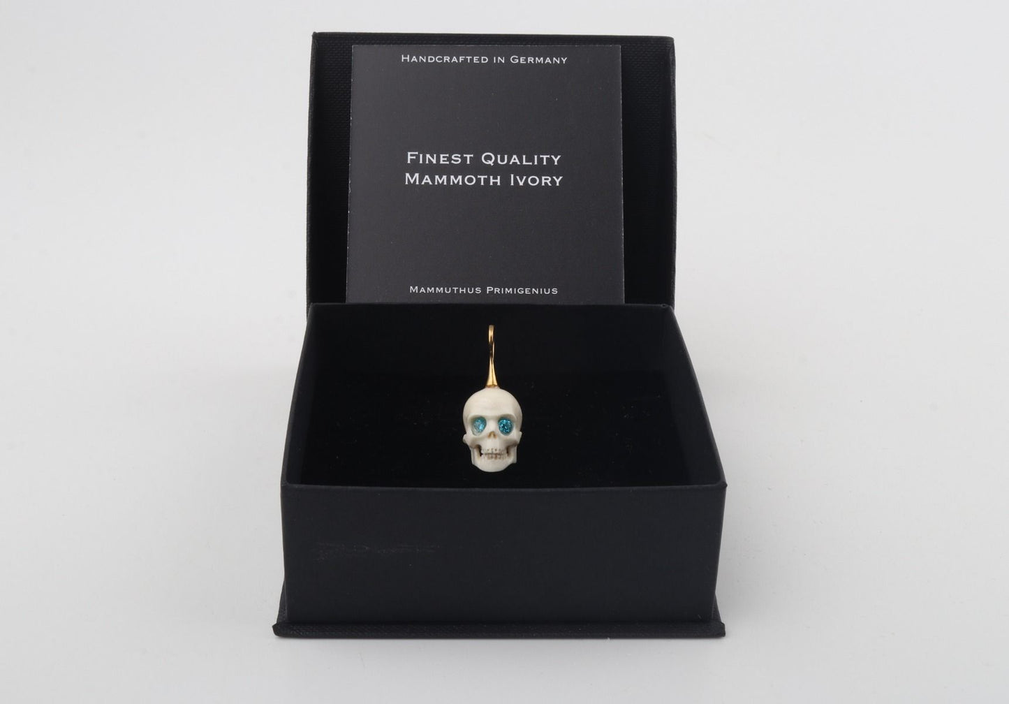 Festive Mammoth Ivory Skull Pendant 