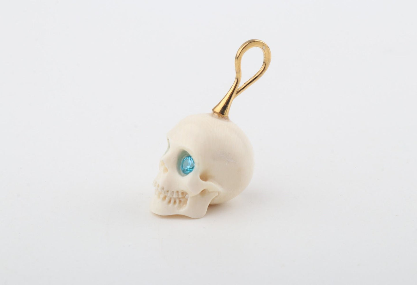 Festive Mammoth Ivory Skull Pendant 
