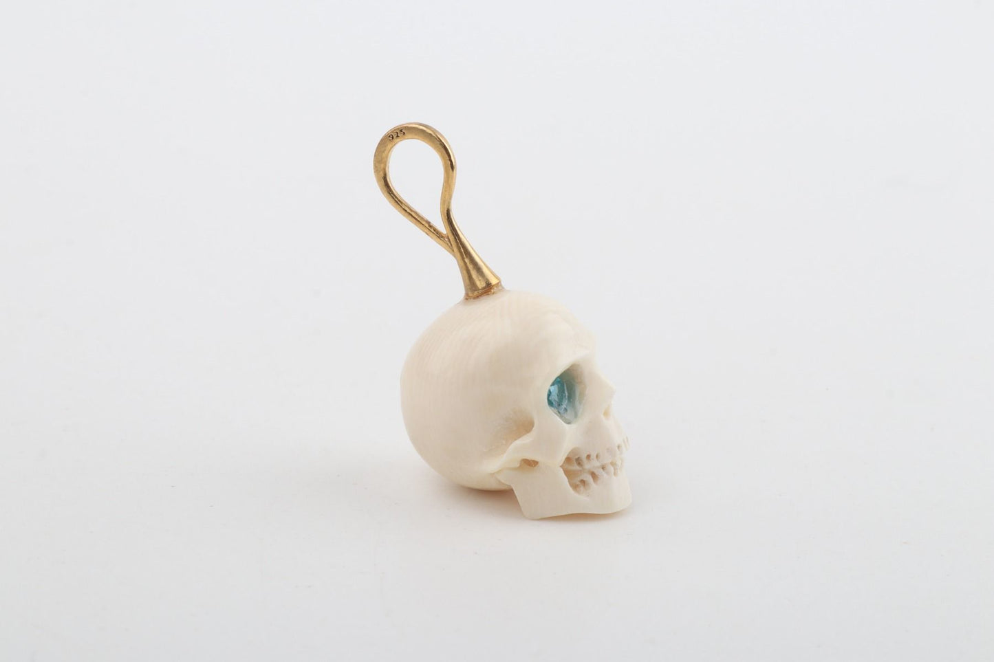 Festive Mammoth Ivory Skull Pendant 