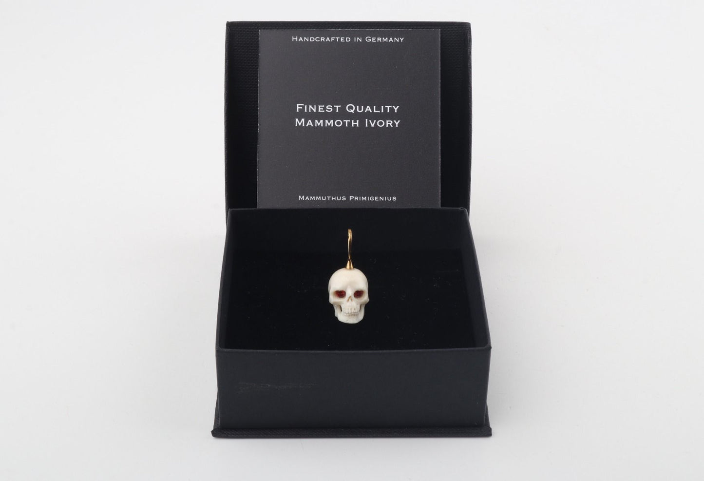 Festive Mammoth Ivory Skull Pendant