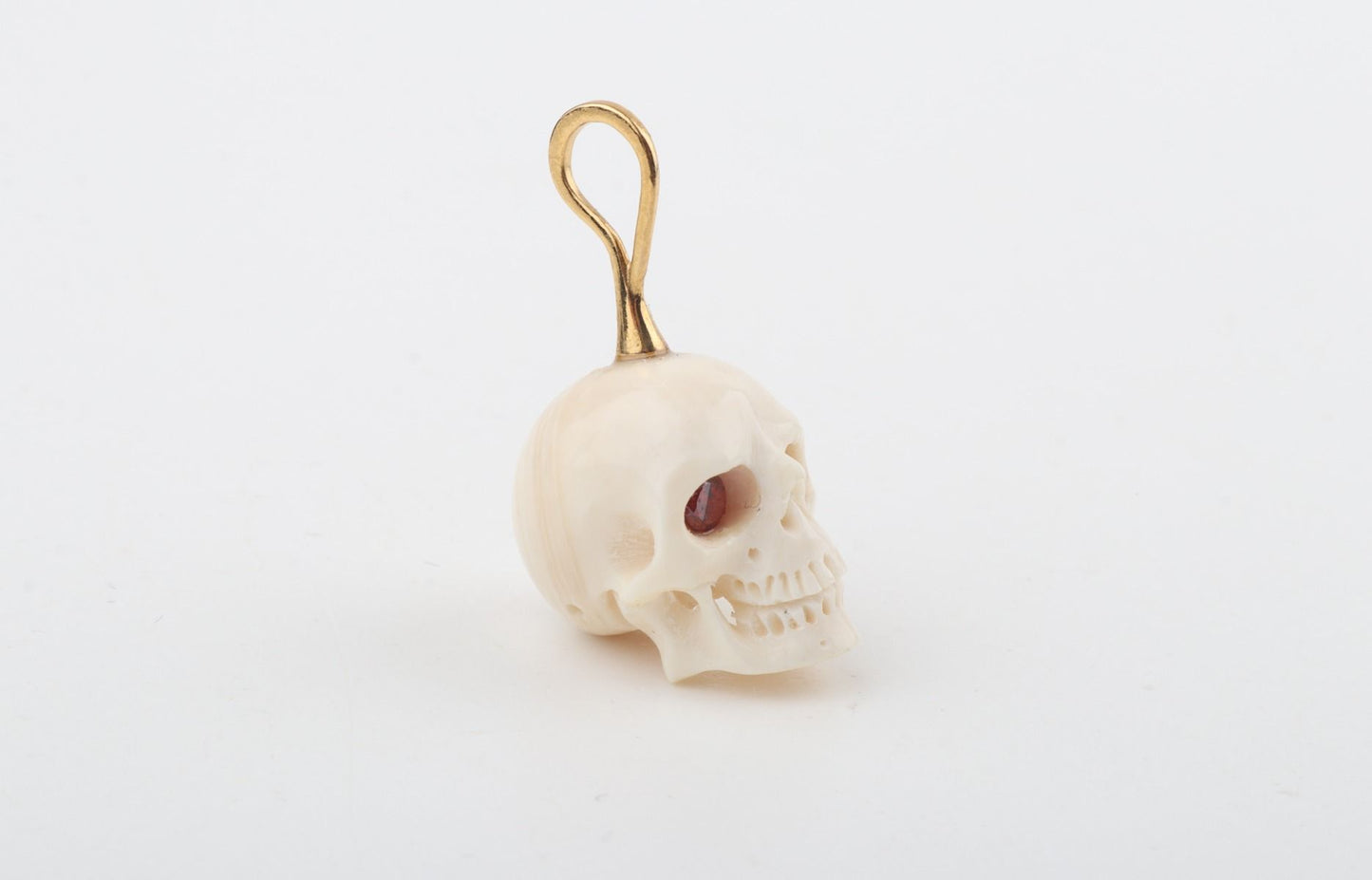 Festive Mammoth Ivory Skull Pendant