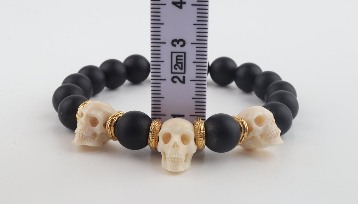 Mammoth Ivory Skulls & Matte Black Beads Bracelet