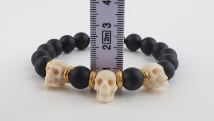 Mammoth Ivory Skulls & Matte Black Beads Bracelet