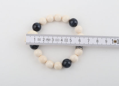 White Mammoth Skull & Flacon's Eye Bracelet