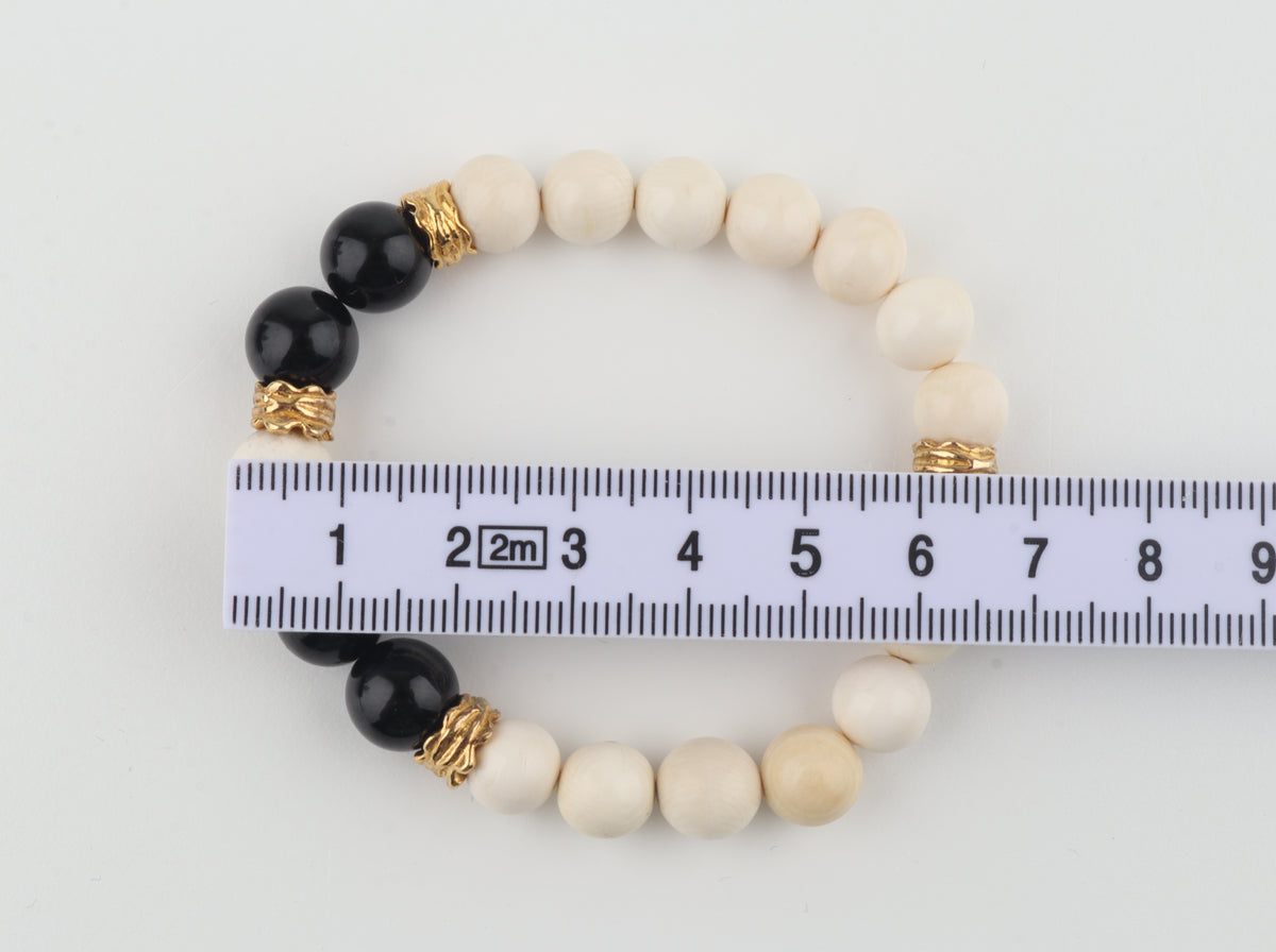 Arctic Noir — Mammoth Ivory & Black Obsidian Bracelet