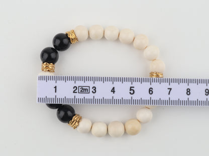 Arctic Noir — Mammoth Ivory & Black Obsidian Bracelet