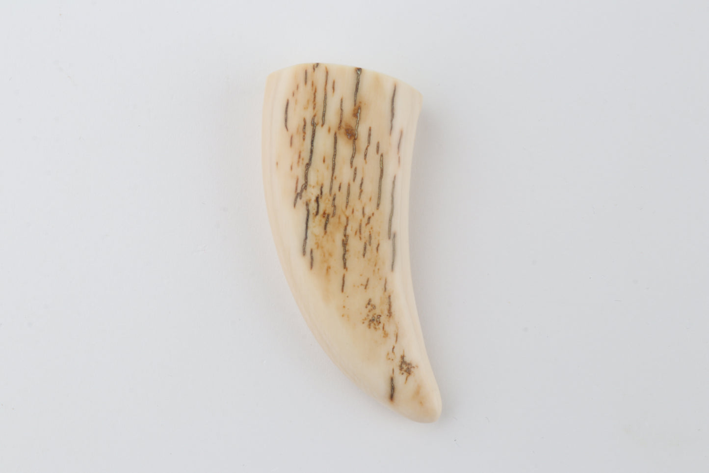 Carved mammoth ivory pendant