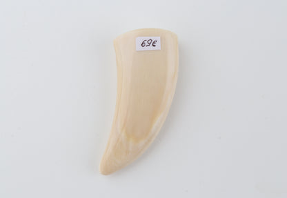 Carved mammoth ivory pendant