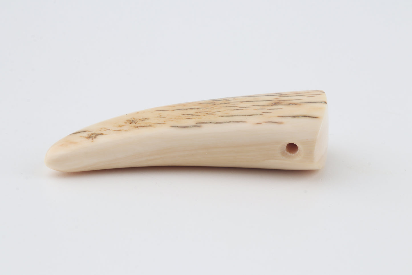 Carved mammoth ivory pendant
