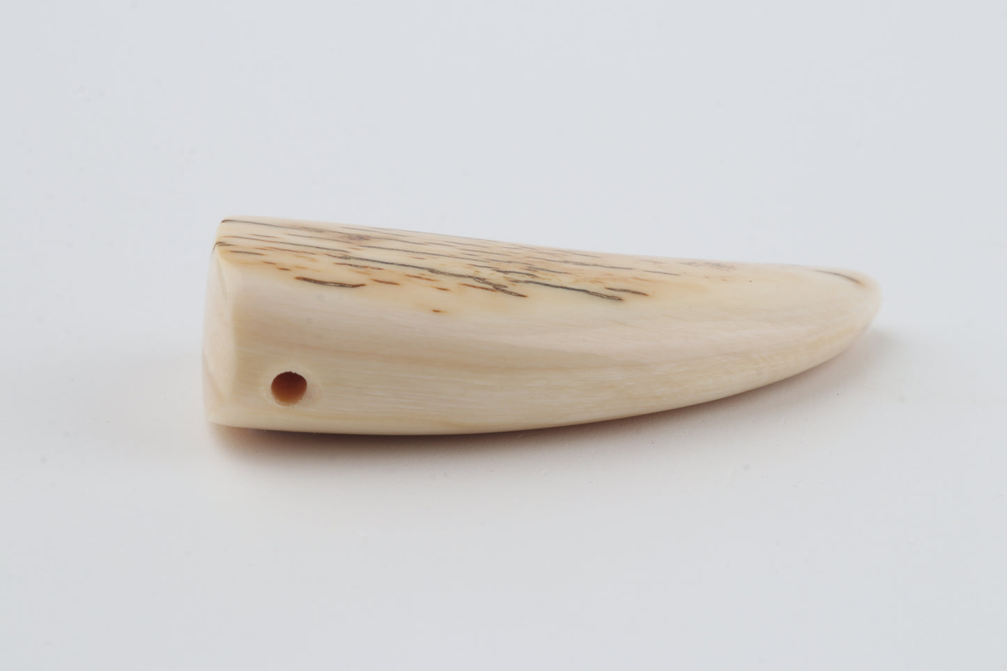 Carved mammoth ivory pendant