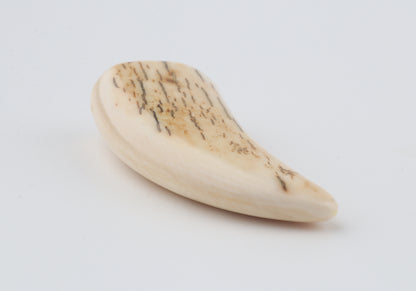 Carved mammoth ivory pendant