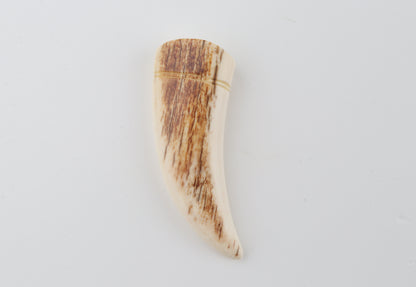 Carved mammoth ivory pendant