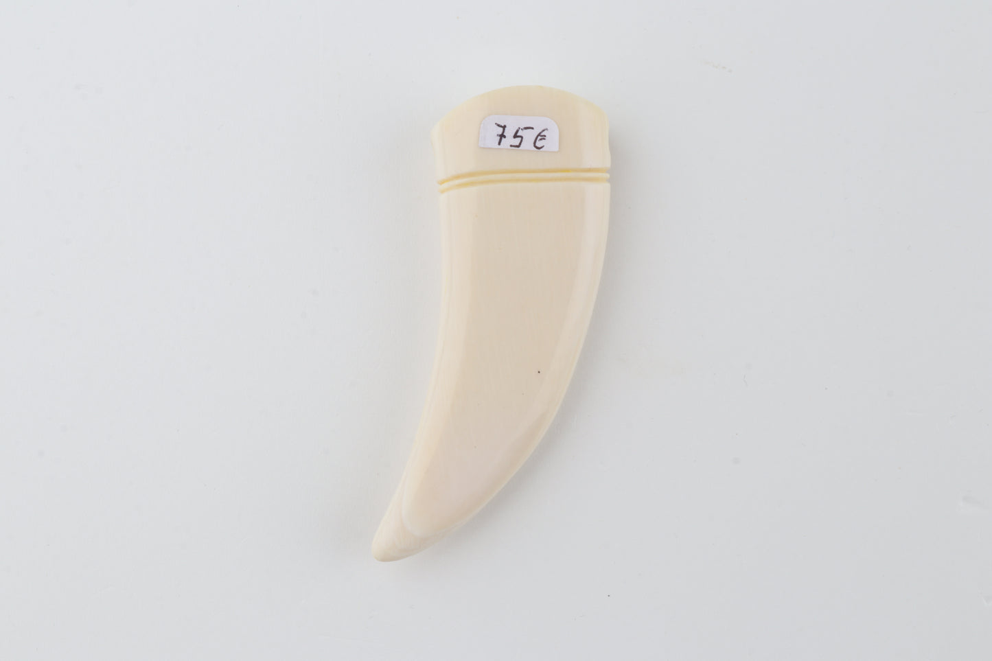 Carved mammoth ivory pendant