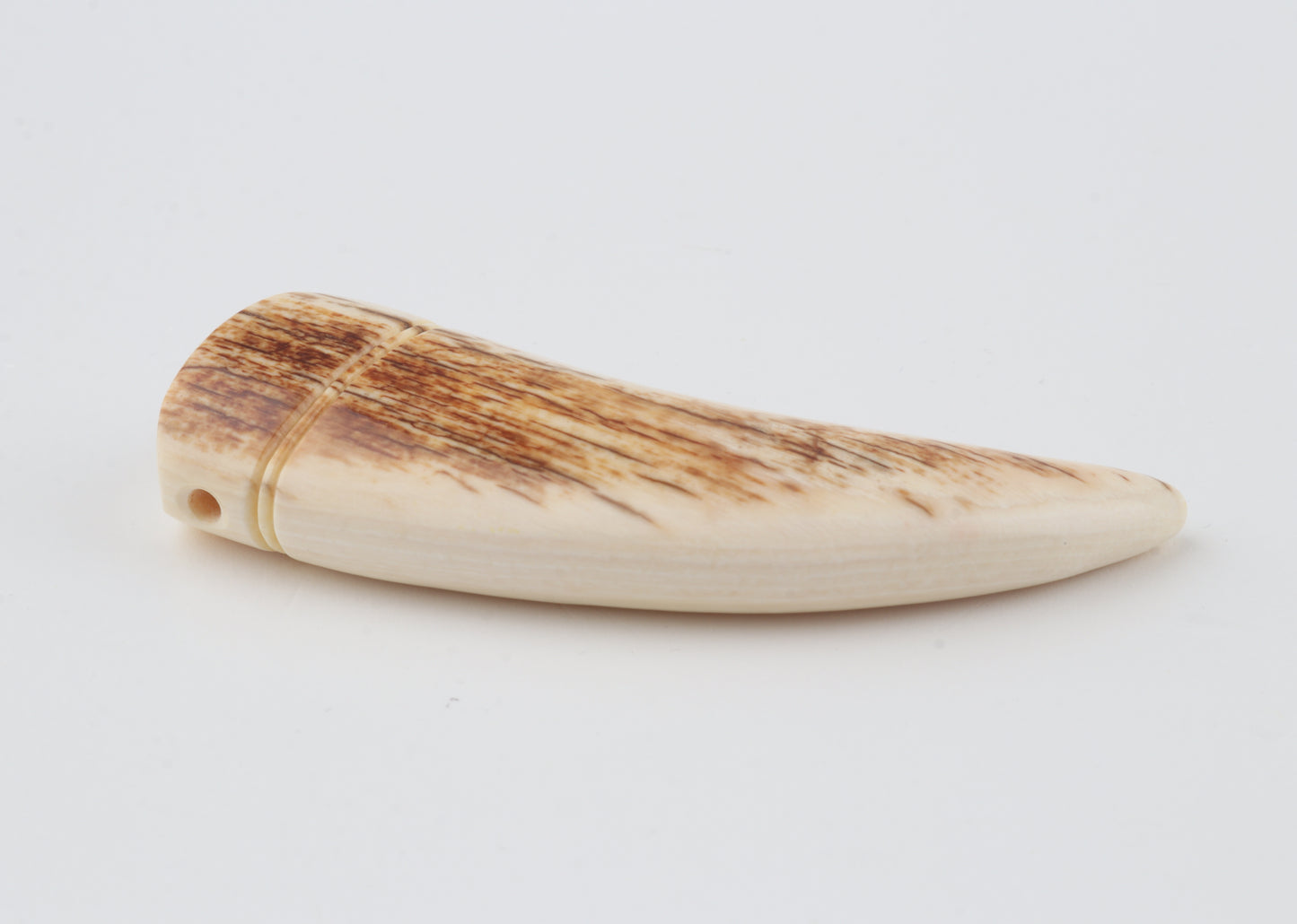 Carved mammoth ivory pendant