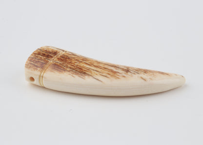 Carved mammoth ivory pendant